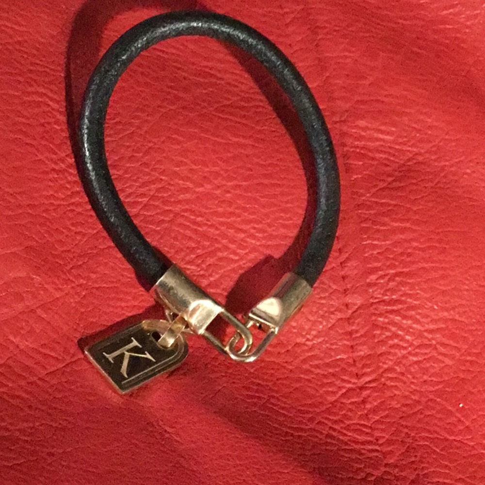 Bronzo Italia Rose bronze K initial tag 7~1\2 leather bracelet.